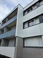 Façade rénovée avec bardage moderne